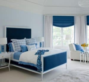 awesome-bedroom-design-with-blue-tones-also-white-furry-rug-and-chair-beside-window-768x706