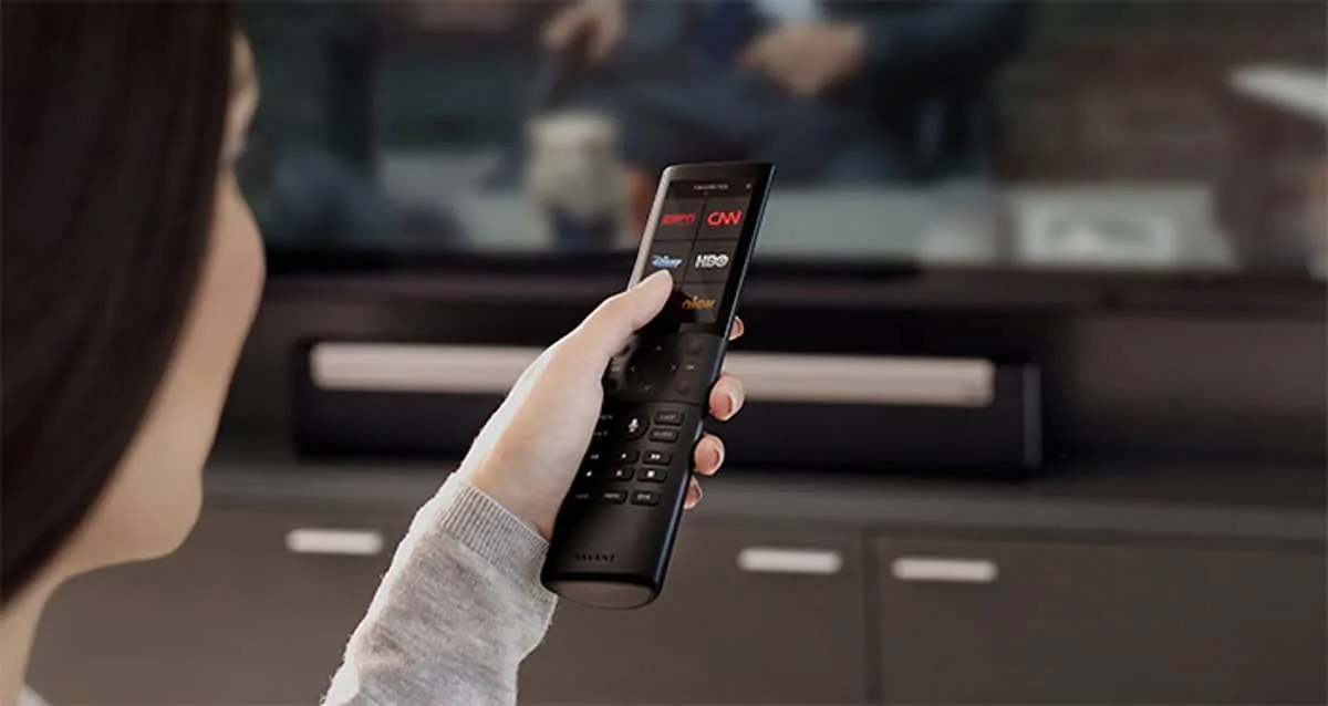 woman holding savant home theater smart remote